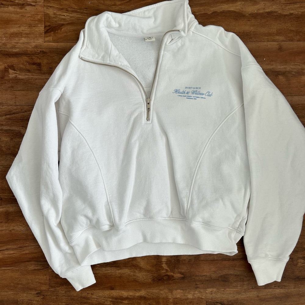 Sporty and rich white quarter zip pullover